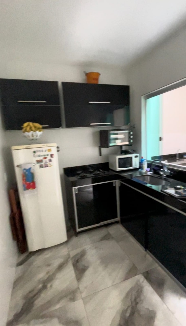 Casa à venda com 3 quartos, 109m² - Foto 4