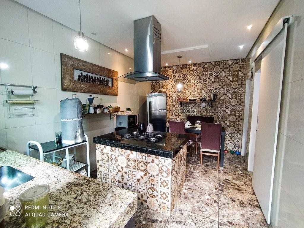 Casa à venda com 4 quartos, 318m² - Foto 6