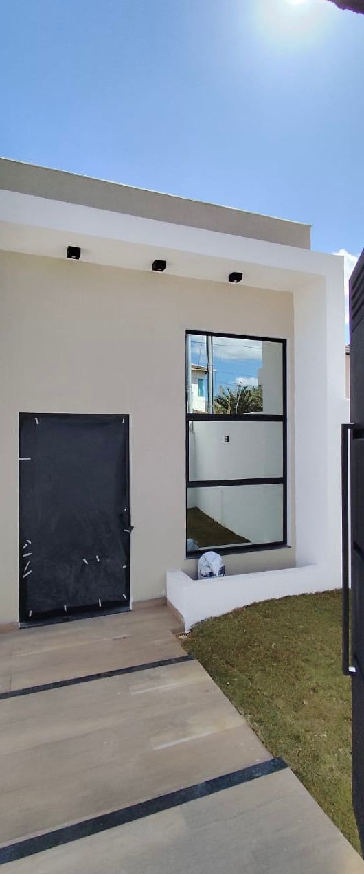 Casa à venda com 3 quartos, 98m² - Foto 1